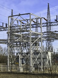 Part of electrical substation with steel lattice structures