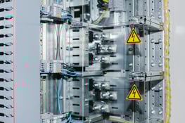 closeup electrical power busbar and terminal blocks